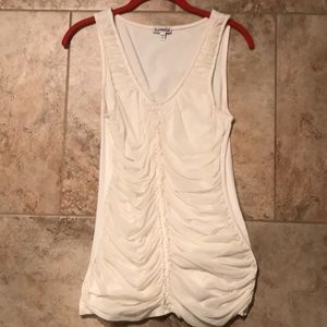 Cute cream colored, ruffled tank